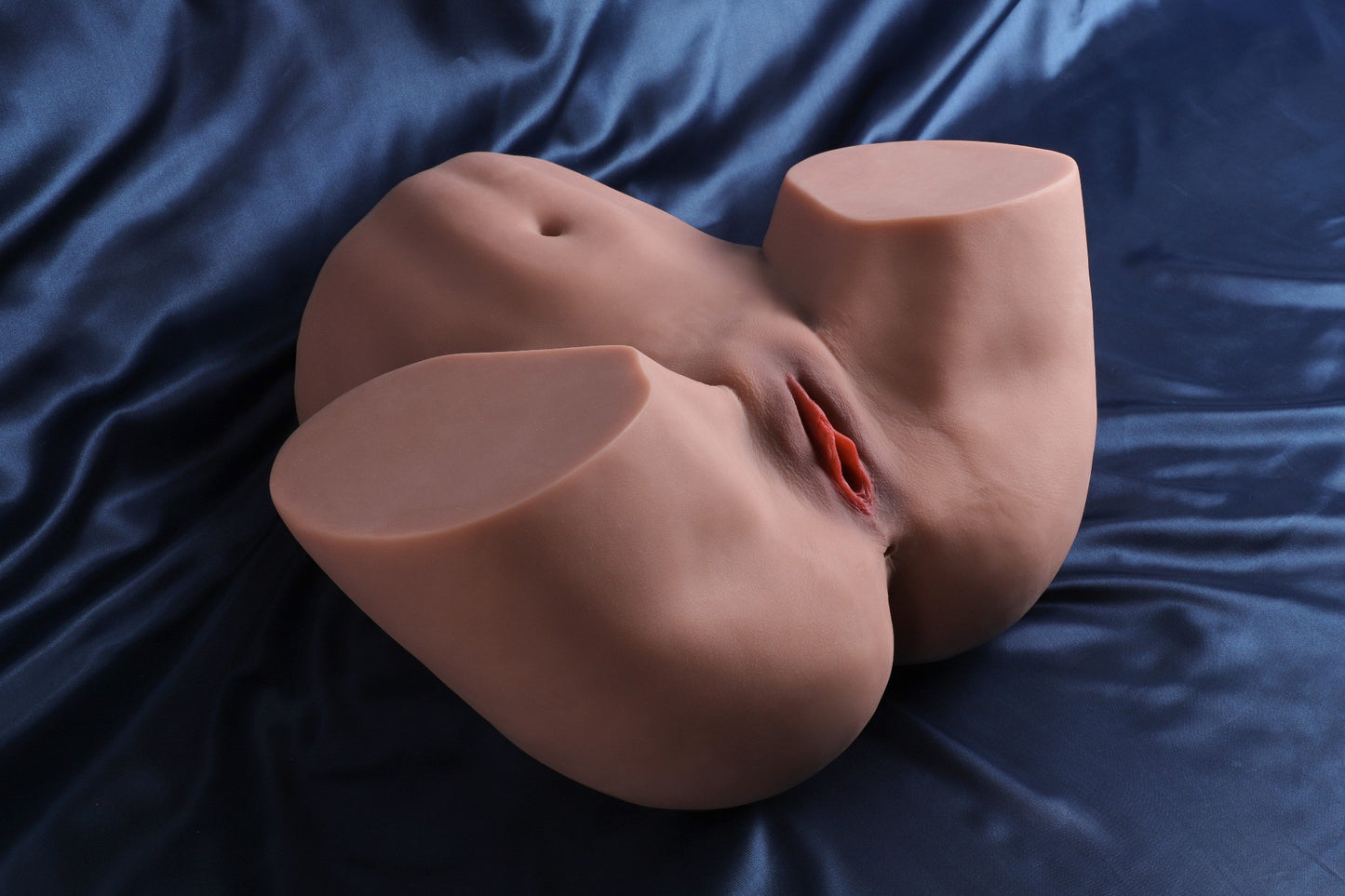 Angled top view of curvy lower body sex doll with smooth TPE finish