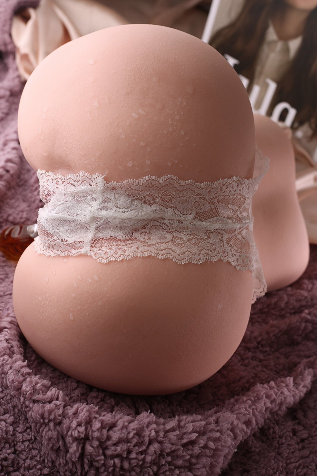 6kg slim waist big ass sex doll rear vertical view with lace panties on soft blanket backdrop